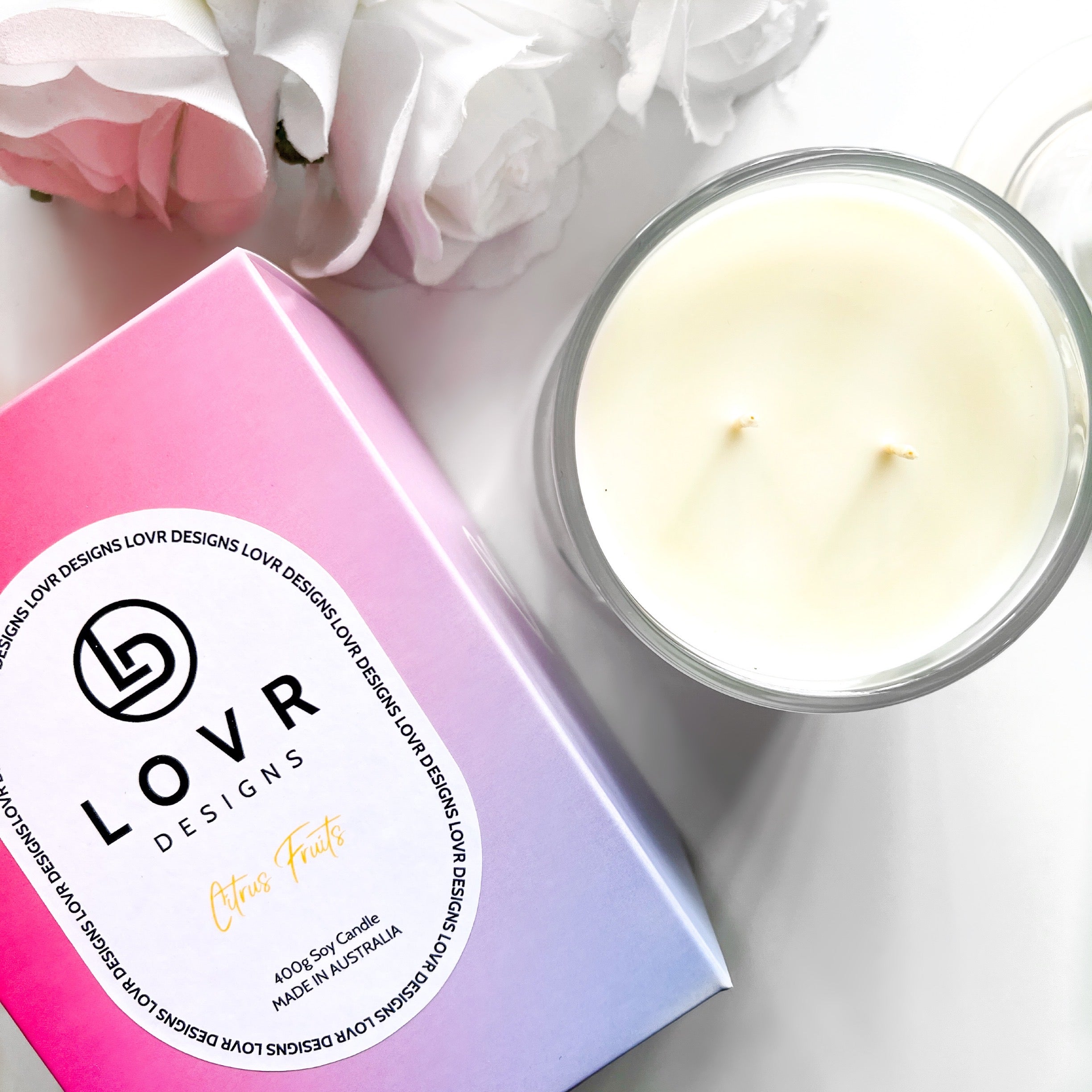 Citrus Fruits Scented Soy Wax Candle. Lovr Designs. Melbourne Candles. Hand Poured in Melbourne. A Fragrance With A Playful Rendition Of The Classic Tropical Mixed Drink That Blends Fresh Pineapple And Orange With Tart Cranberries And Notes Of Peach. Extra Large Candle. Huge Scented Candle.