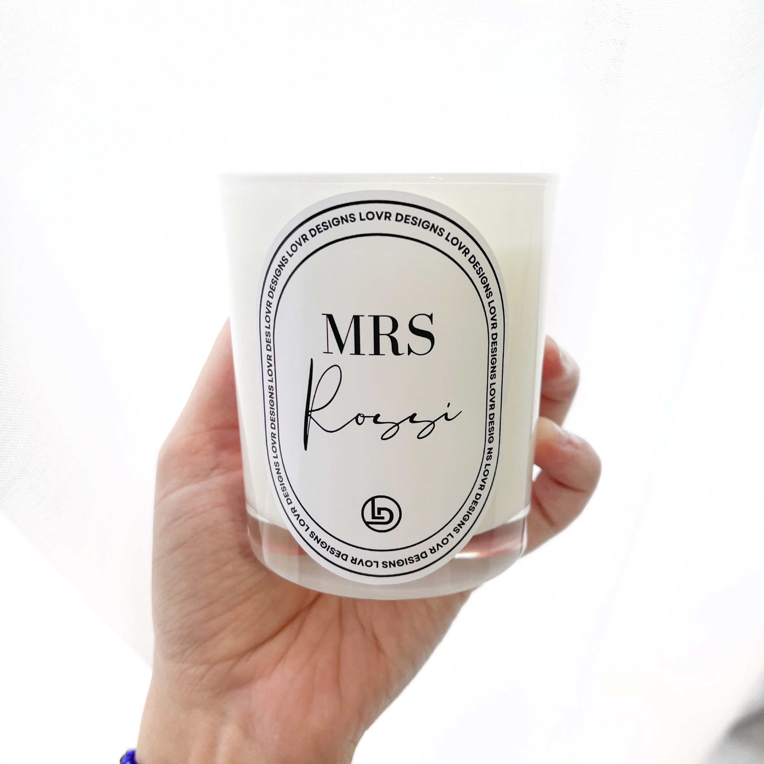 Personalised Mrs Name Candle. A Great Wedding Gift Idea - Made in Melbourne by Lovr Designs. Available in a number of sizes, colours and candle fragrances choices to choose from. Completed in a luxury gift box that is sure to impress as the perfect Bridal Proposal Gift. Complete with a Personalised Name, Text, or Proposal the choices are endless!