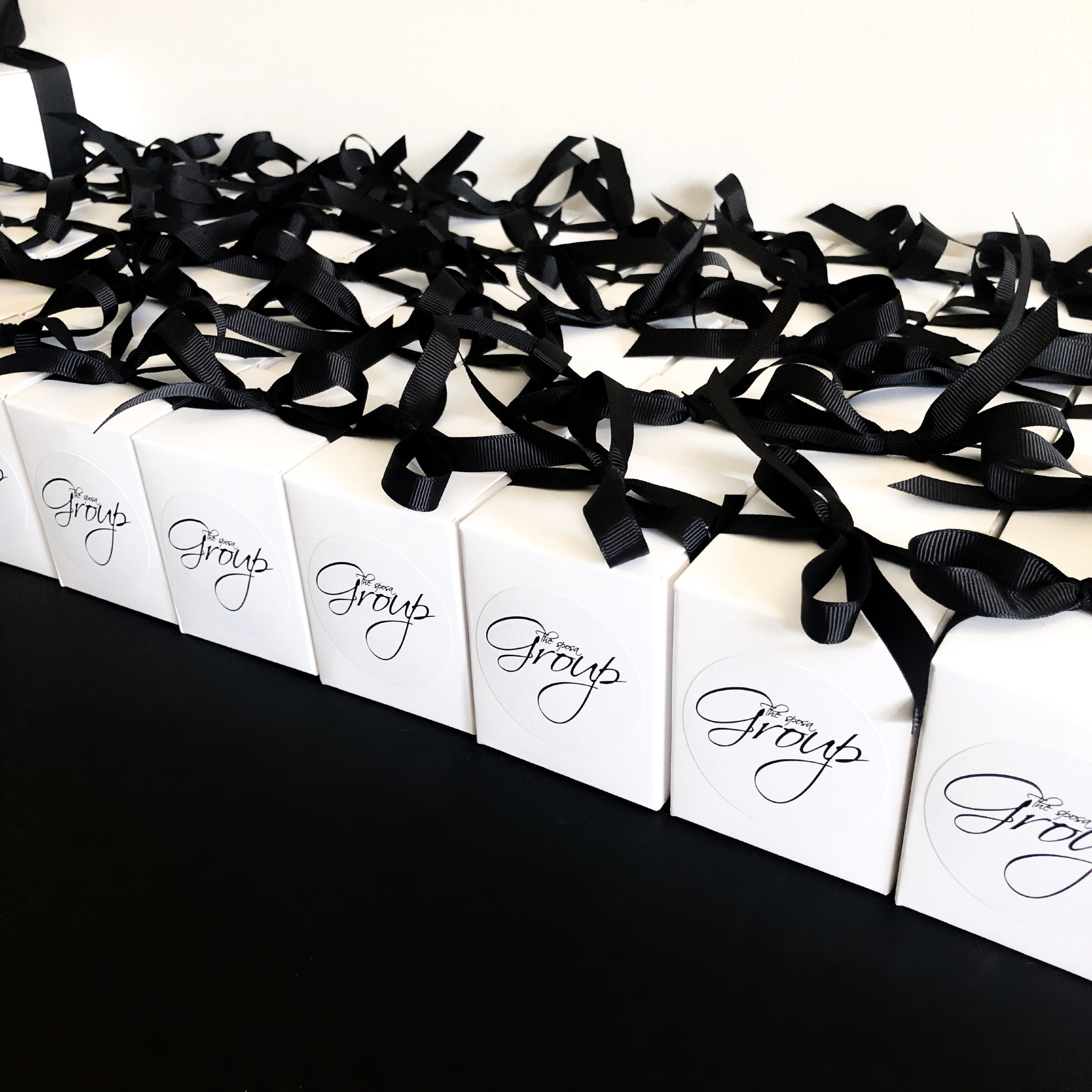 The Sposa Group Bridal Shop Event Favours And Branded Candles Used As Customer Gifts. Melbourne Bridal Store. Business Gifts. Business Branded Candles. Logo Candles. Bulk Candles.